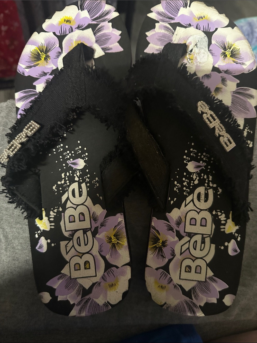 bebe Black Flip Flops with Purple and Yellow Floral Print